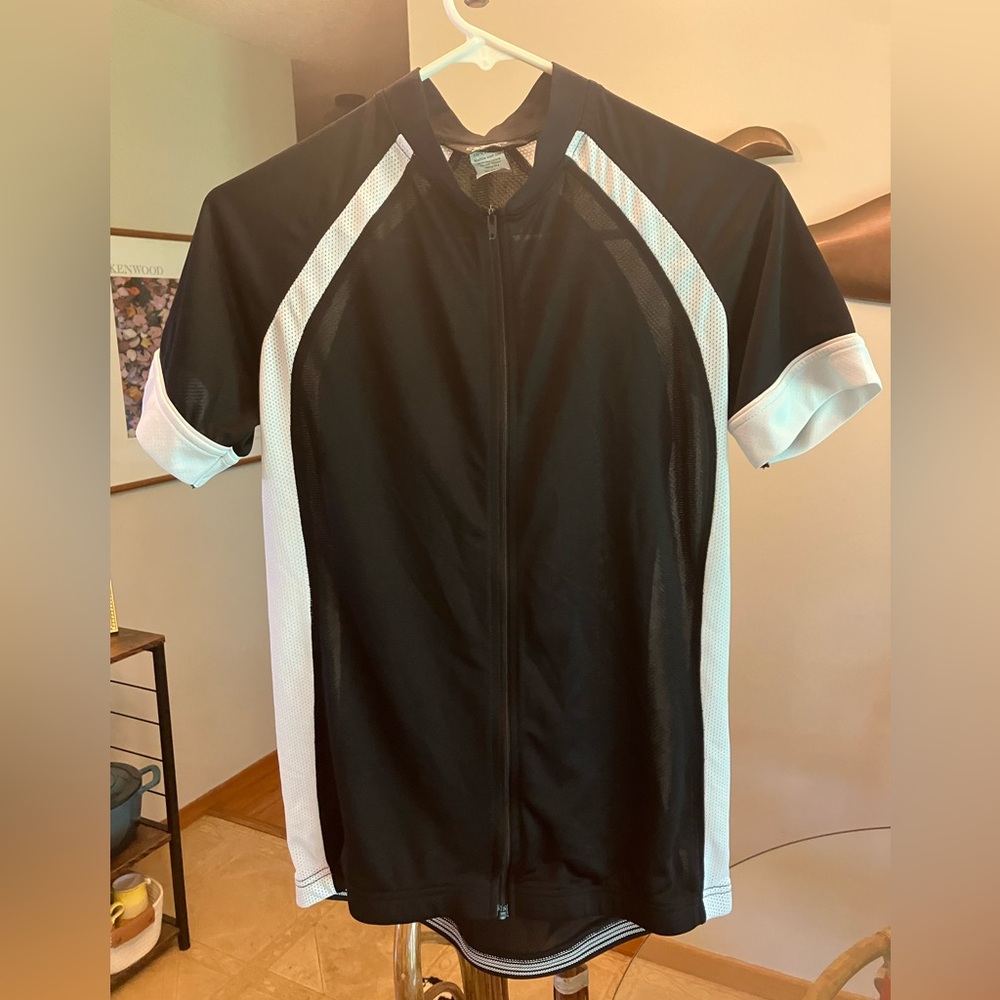Canari black and white cycling jersey. Tagged as L, fits Like M.